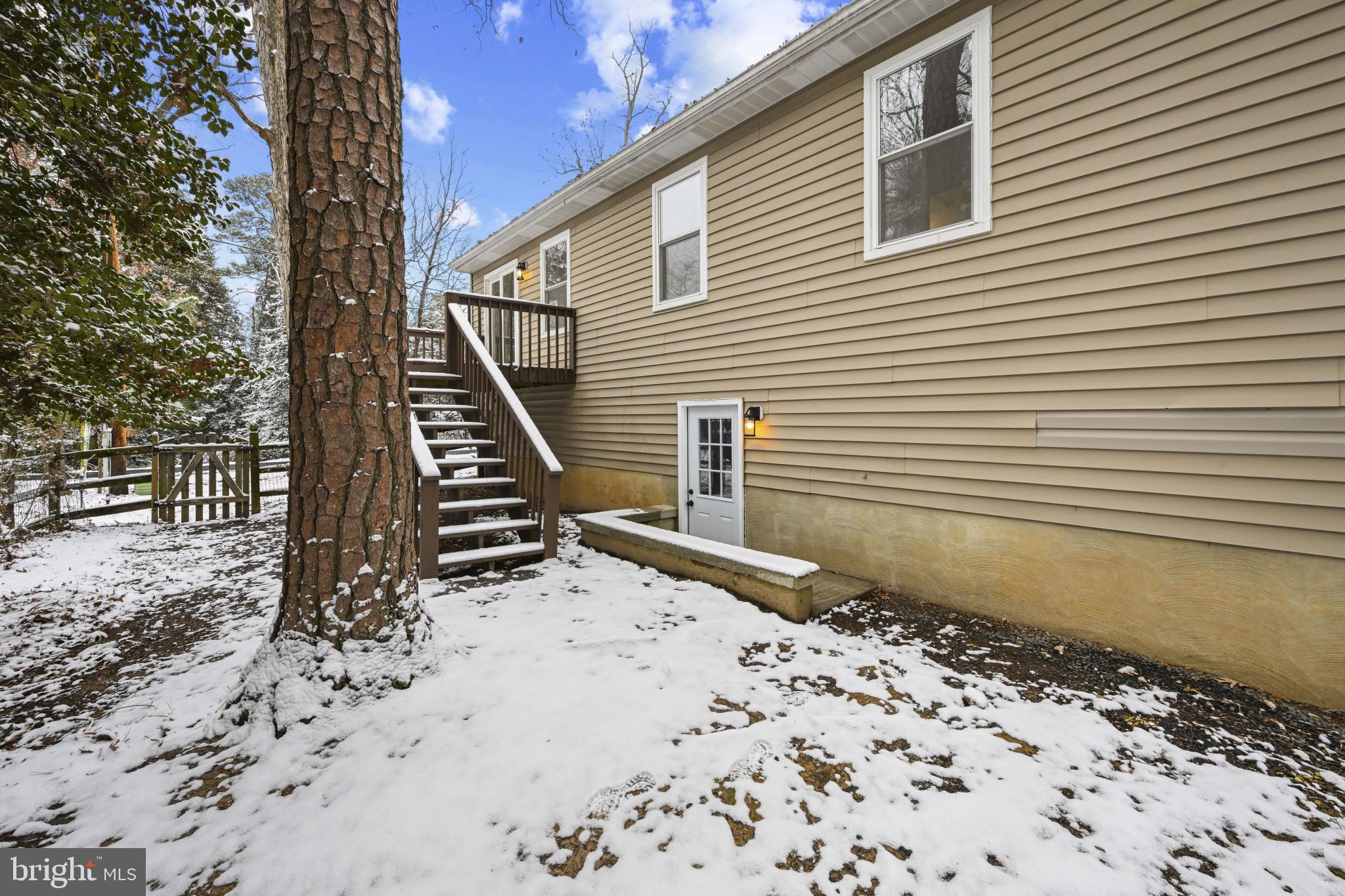 1024 Gringo Lane Lusby, MD 20657 - Photo 25 of 25 a view of a backyard with a house