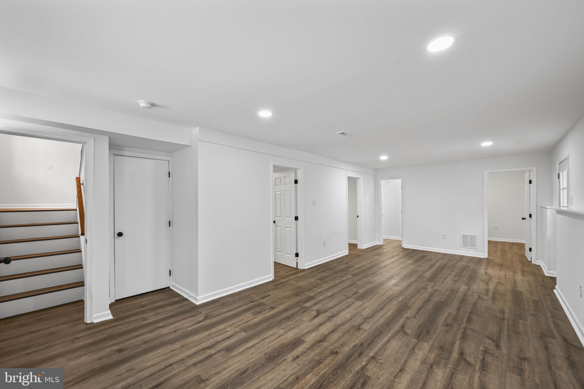 1024 Gringo Lane Lusby, MD 20657 - Photo 4 of 25 a view of an empty room with wooden floor