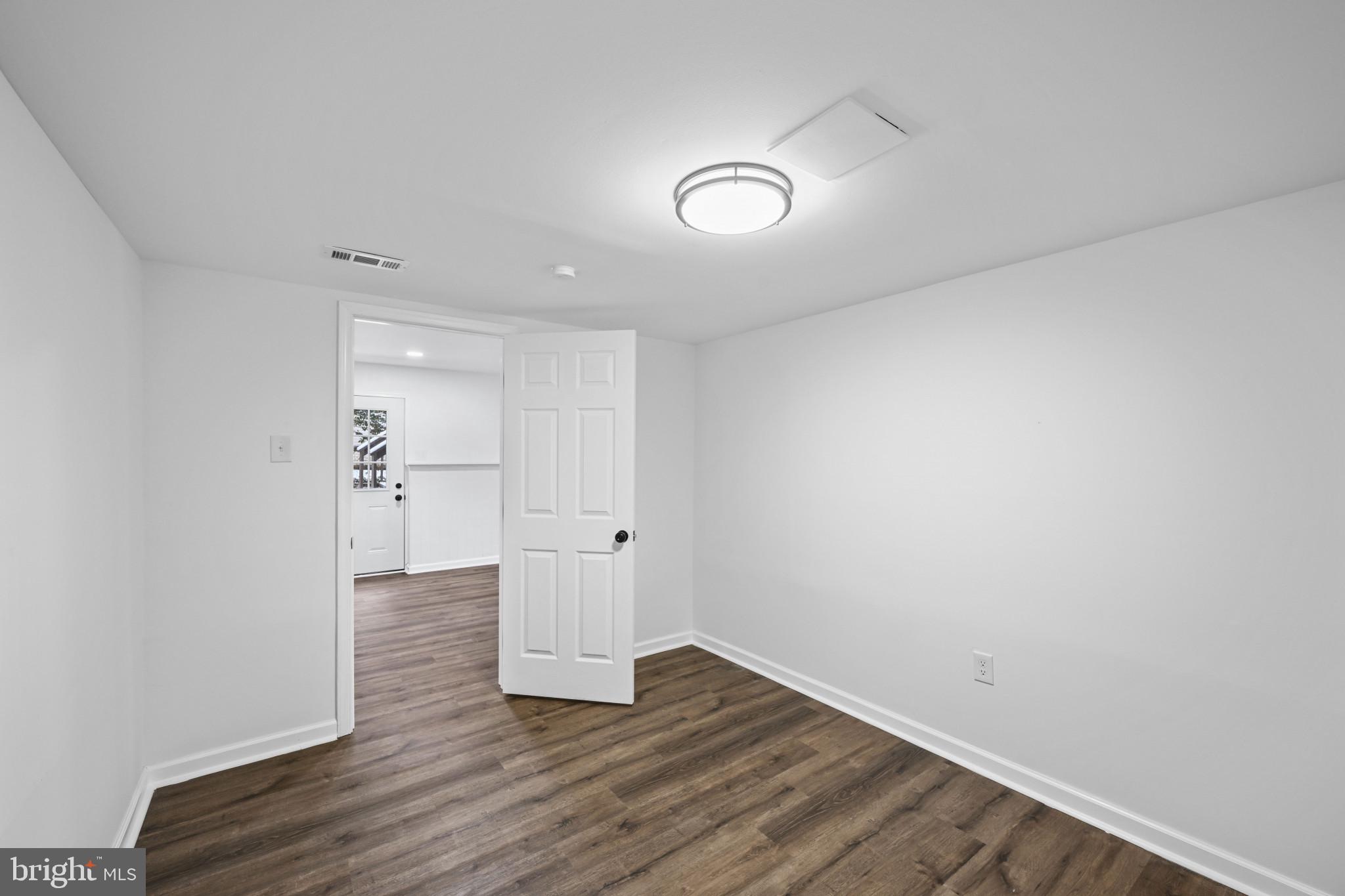 1024 Gringo Lane Lusby, MD 20657 - Photo 7 of 25 a view of empty room with wooden floor