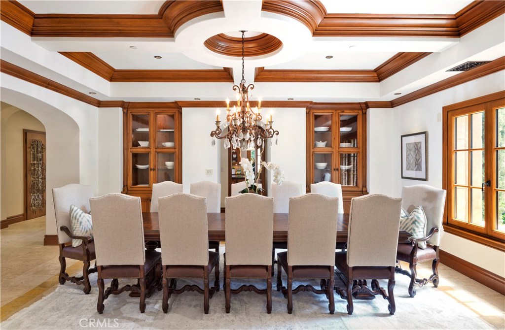97 Canyon Creek Irvine, CA 92603 - Photo 12 of 28 a view of a dining room with furniture and chandelier