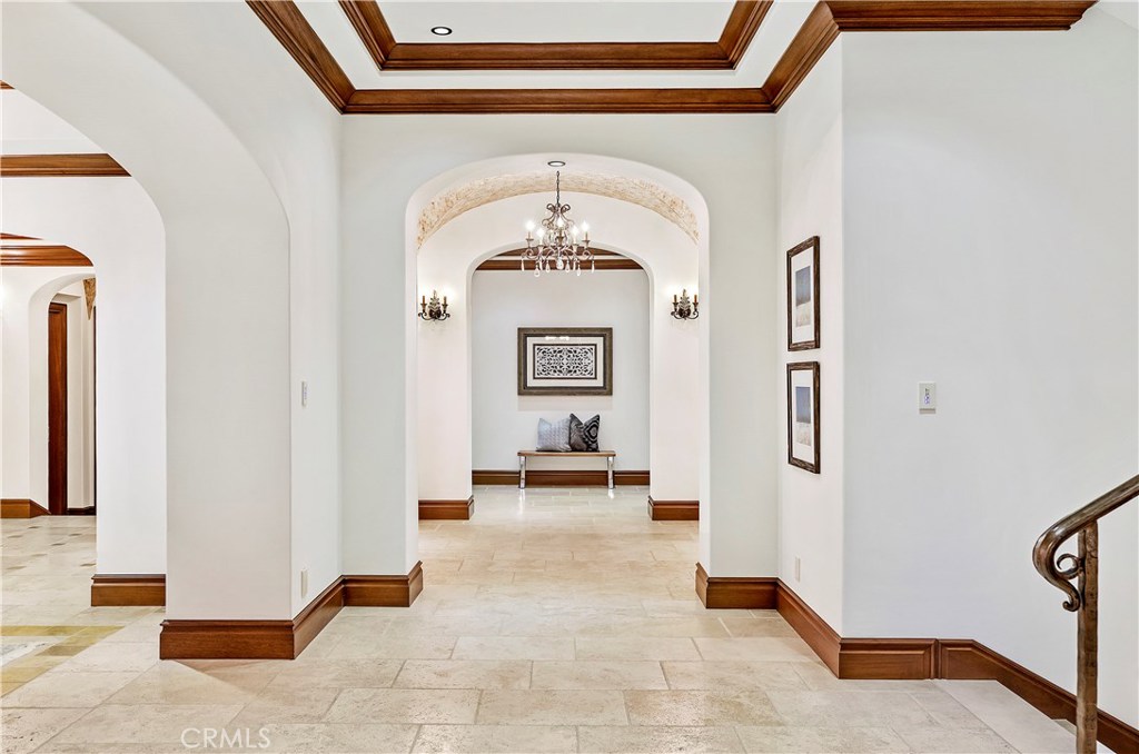 97 Canyon Creek Irvine, CA 92603 - Photo 13 of 28 a view of a hallway with entryway furniture and a kitchen view