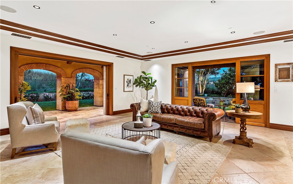 97 Canyon Creek Irvine, CA 92603 - Photo 14 of 28 a living room with furniture and a large window