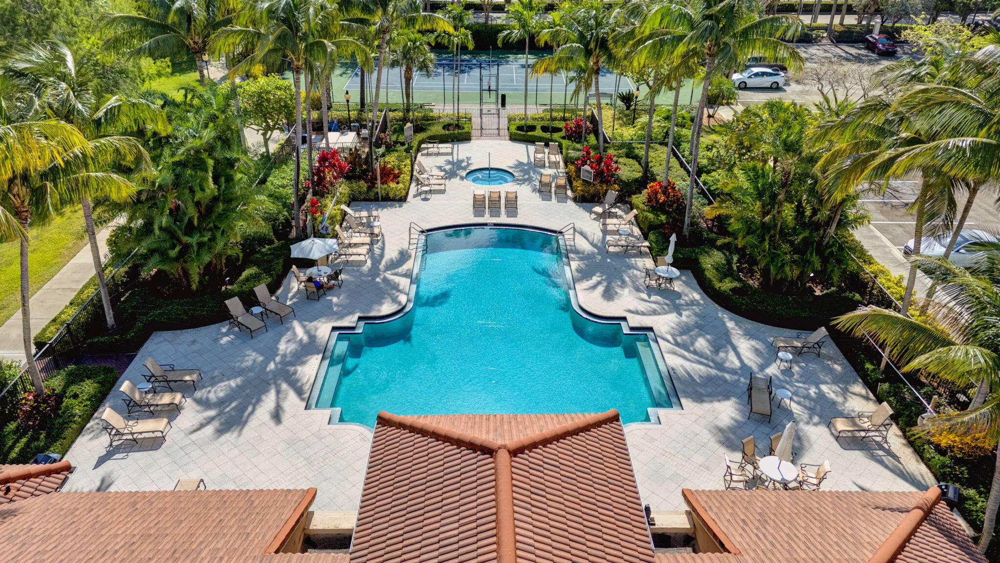 4907 Midtown Lane, Unit 1314 Palm Beach Gardens, FL 33418 - Photo 2 of 57 a view of a chairs and table in backyard