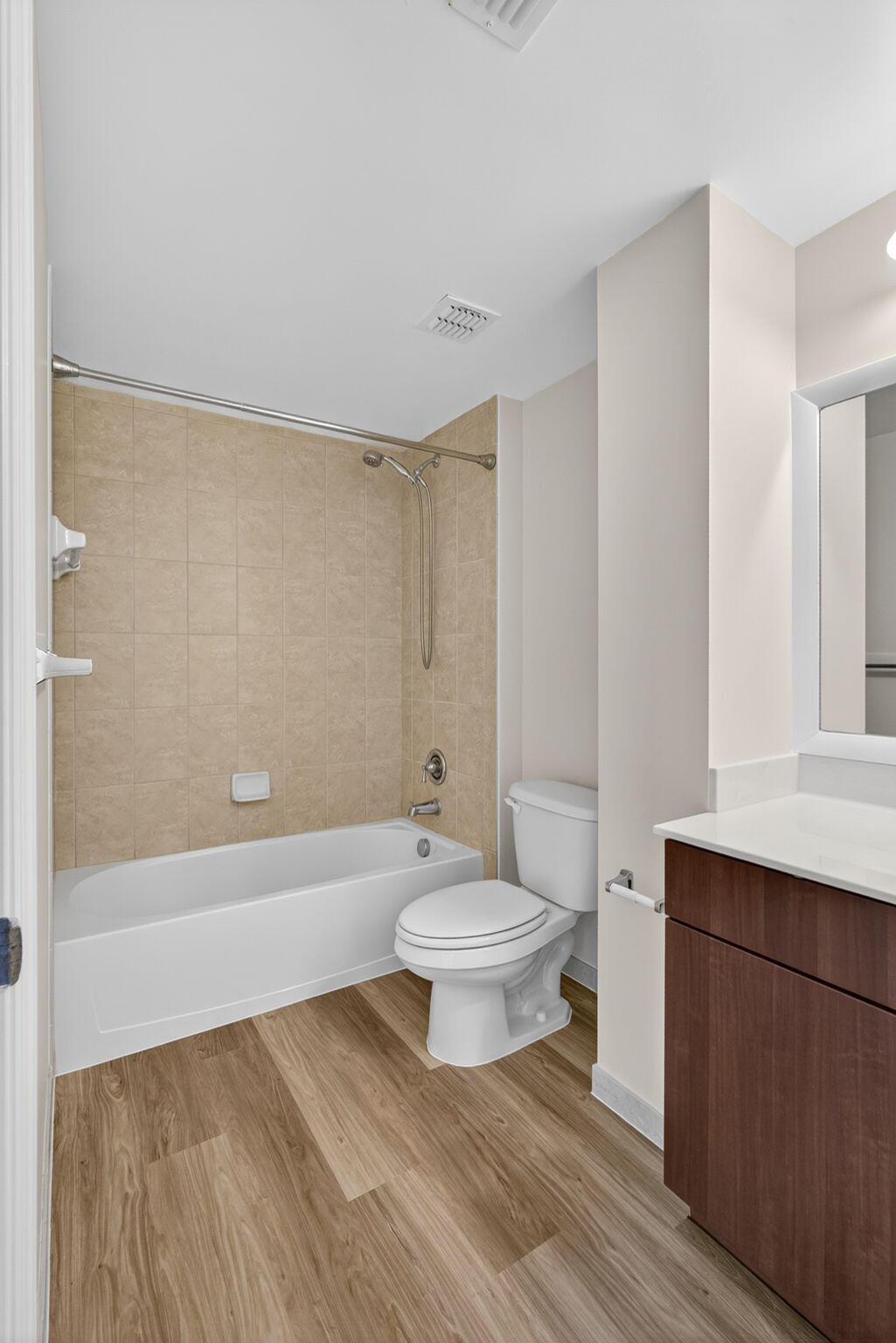 4907 Midtown Lane, Unit 1314 Palm Beach Gardens, FL 33418 - Photo 33 of 57 a bathroom with a toilet a sink and bathtub