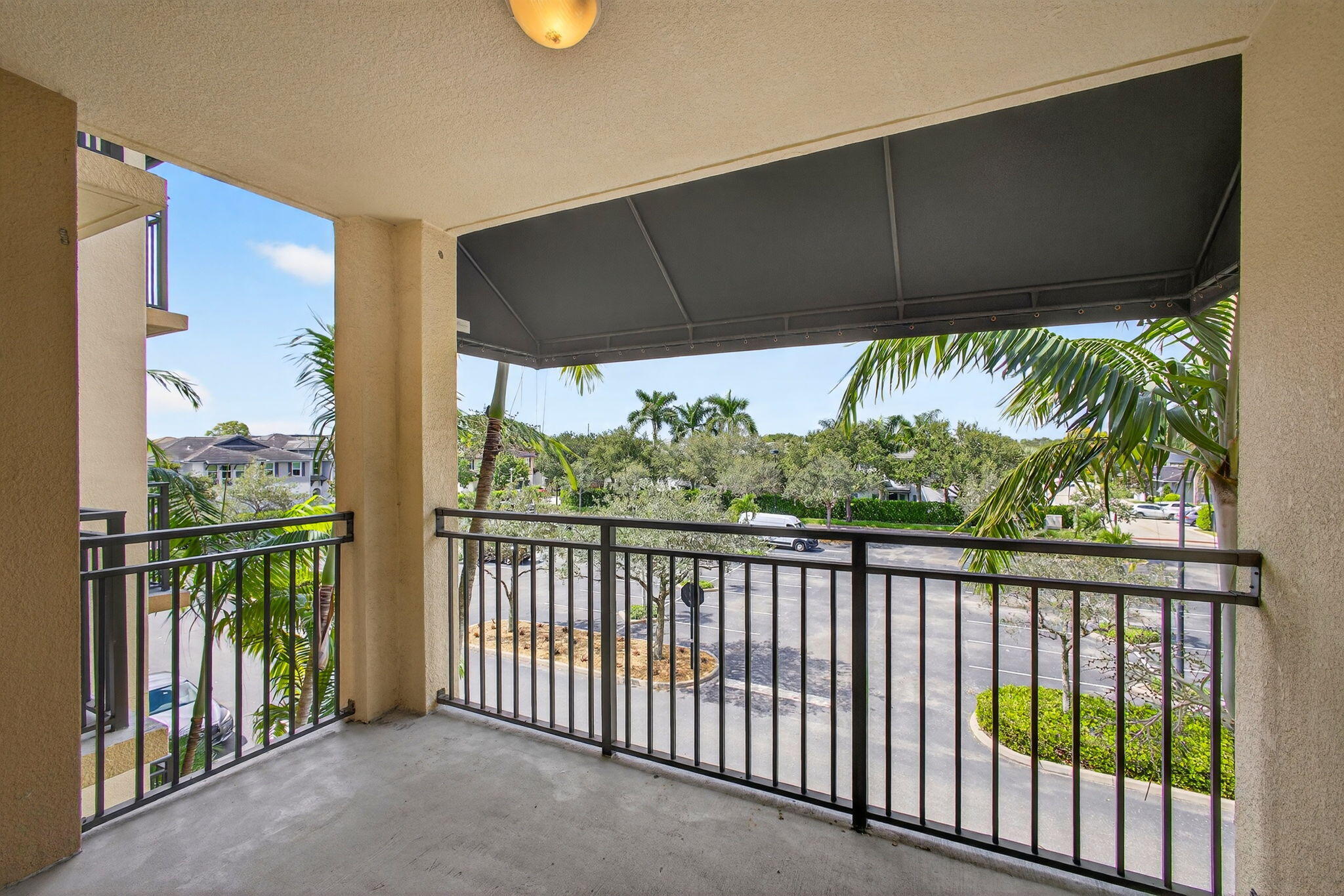 4907 Midtown Lane, Unit 1314 Palm Beach Gardens, FL 33418 - Photo 34 of 57 a view of a porch