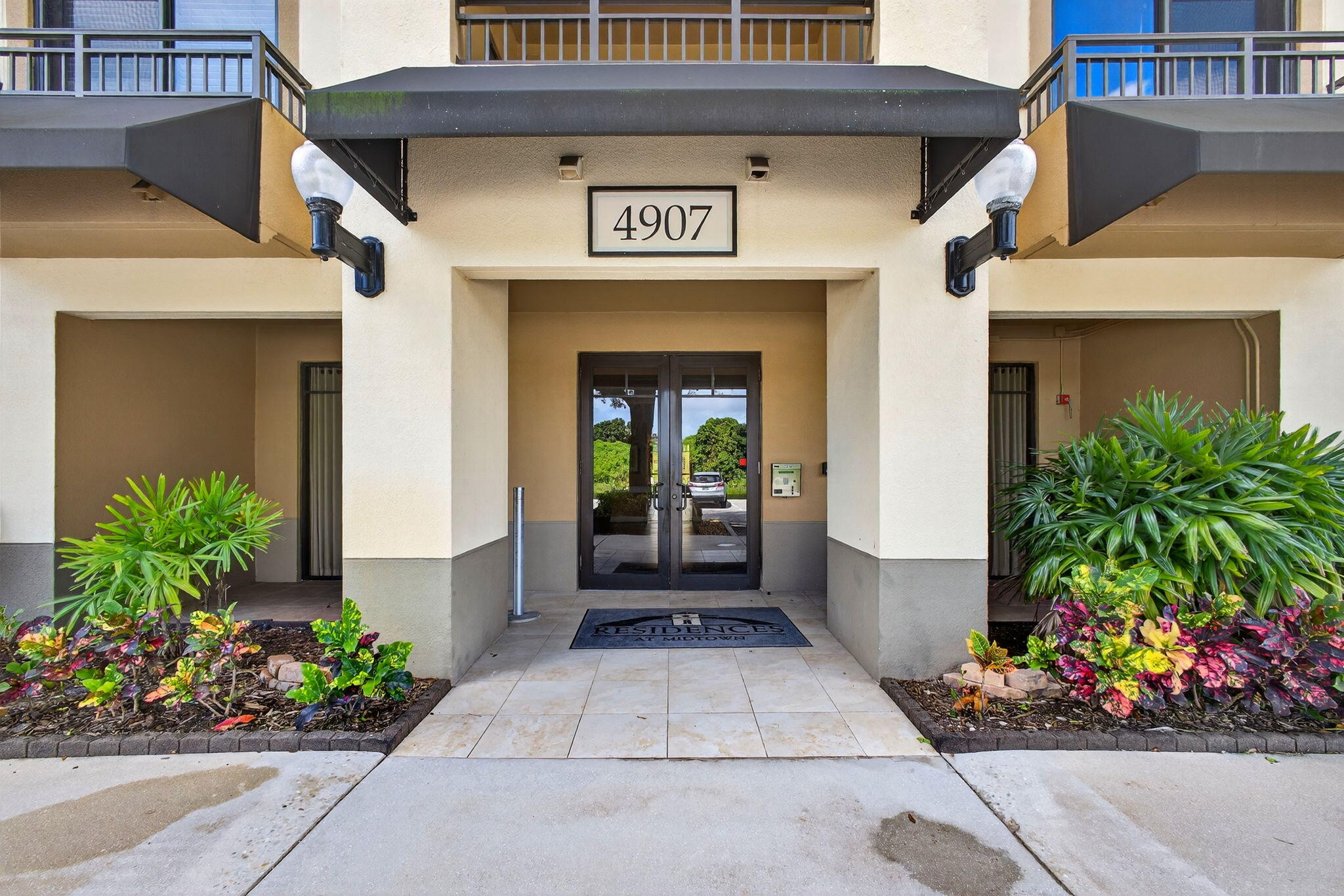 4907 Midtown Lane, Unit 1314 Palm Beach Gardens, FL 33418 - Photo 4 of 57 a view of a entryway door of the house