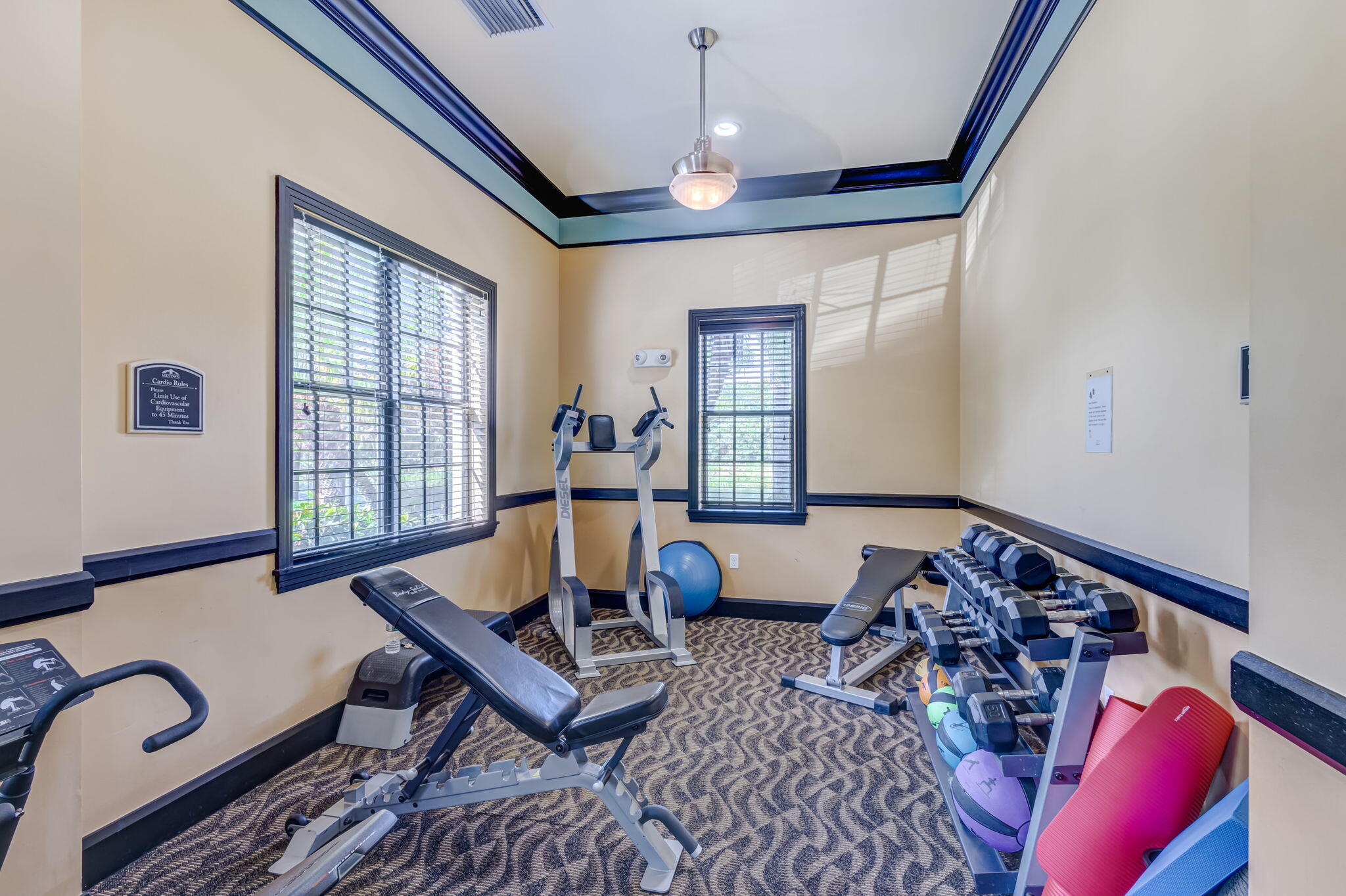 4907 Midtown Lane, Unit 1314 Palm Beach Gardens, FL 33418 - Photo 48 of 57 a living room with furniture rug and window