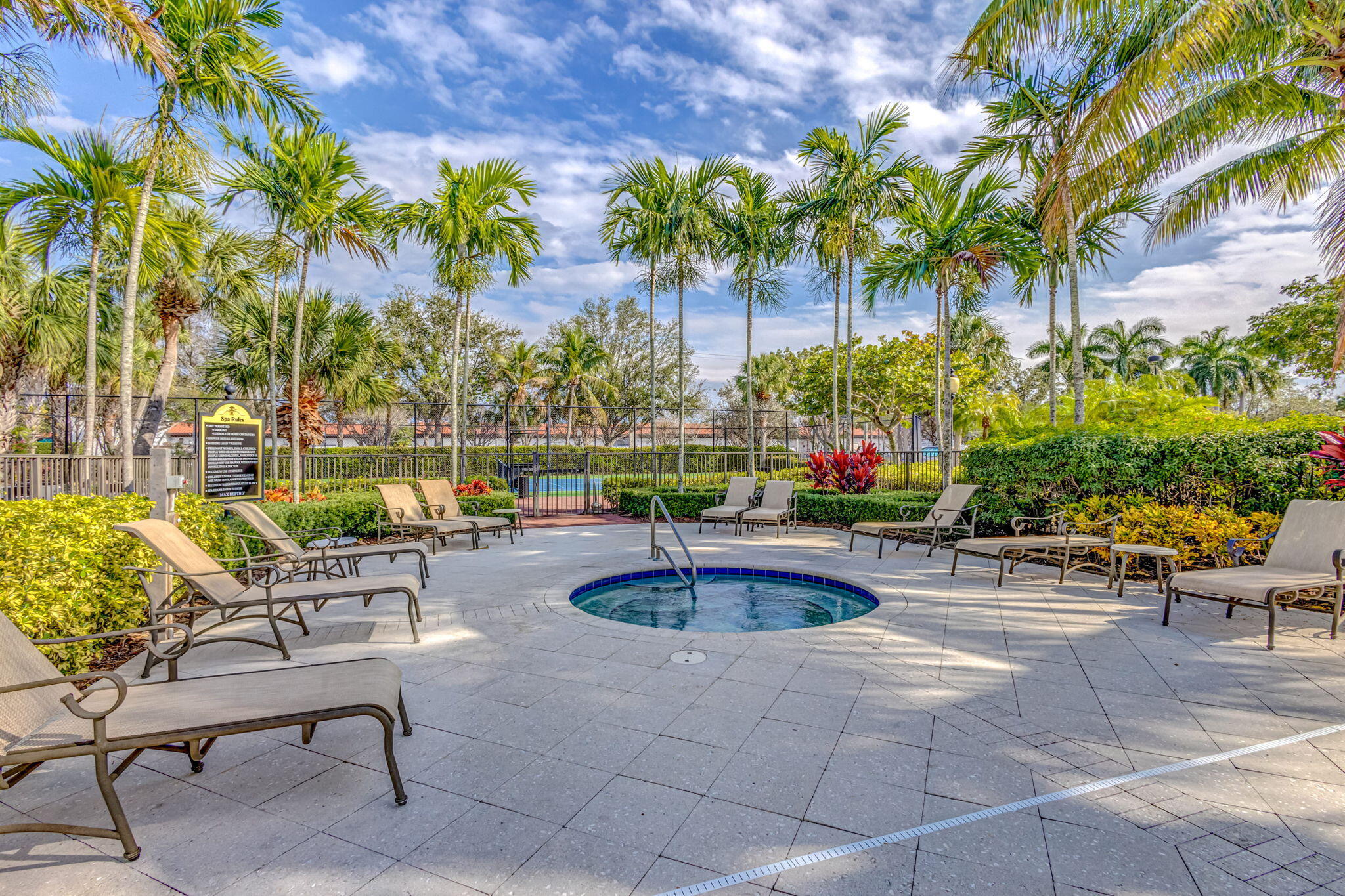 4907 Midtown Lane, Unit 1314 Palm Beach Gardens, FL 33418 - Photo 53 of 57 a view of swimming pool with outdoor seating and plants