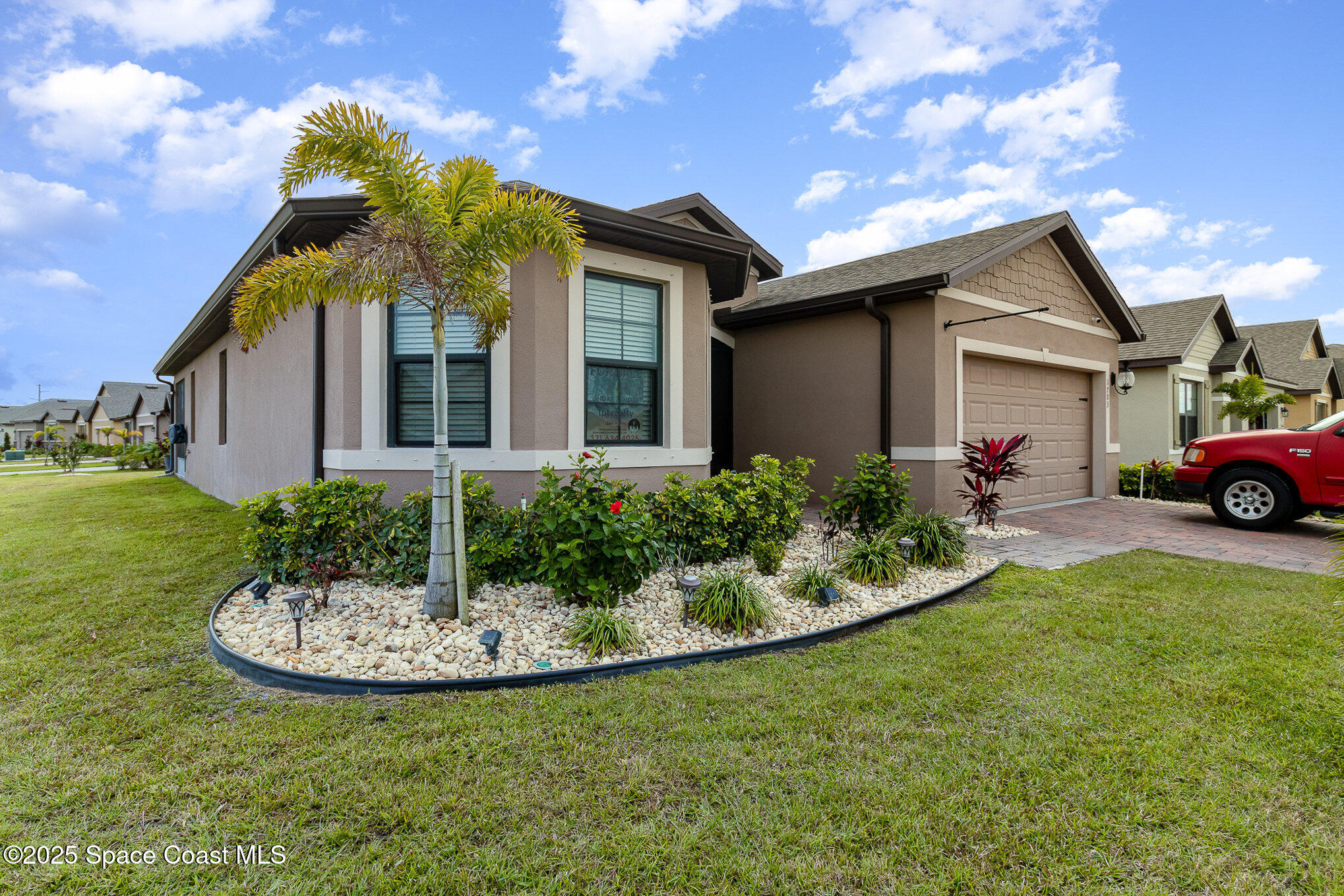 1703 Farmhouse Road Southeast Palm Bay, FL 32909 - Photo 1 of 30 Front