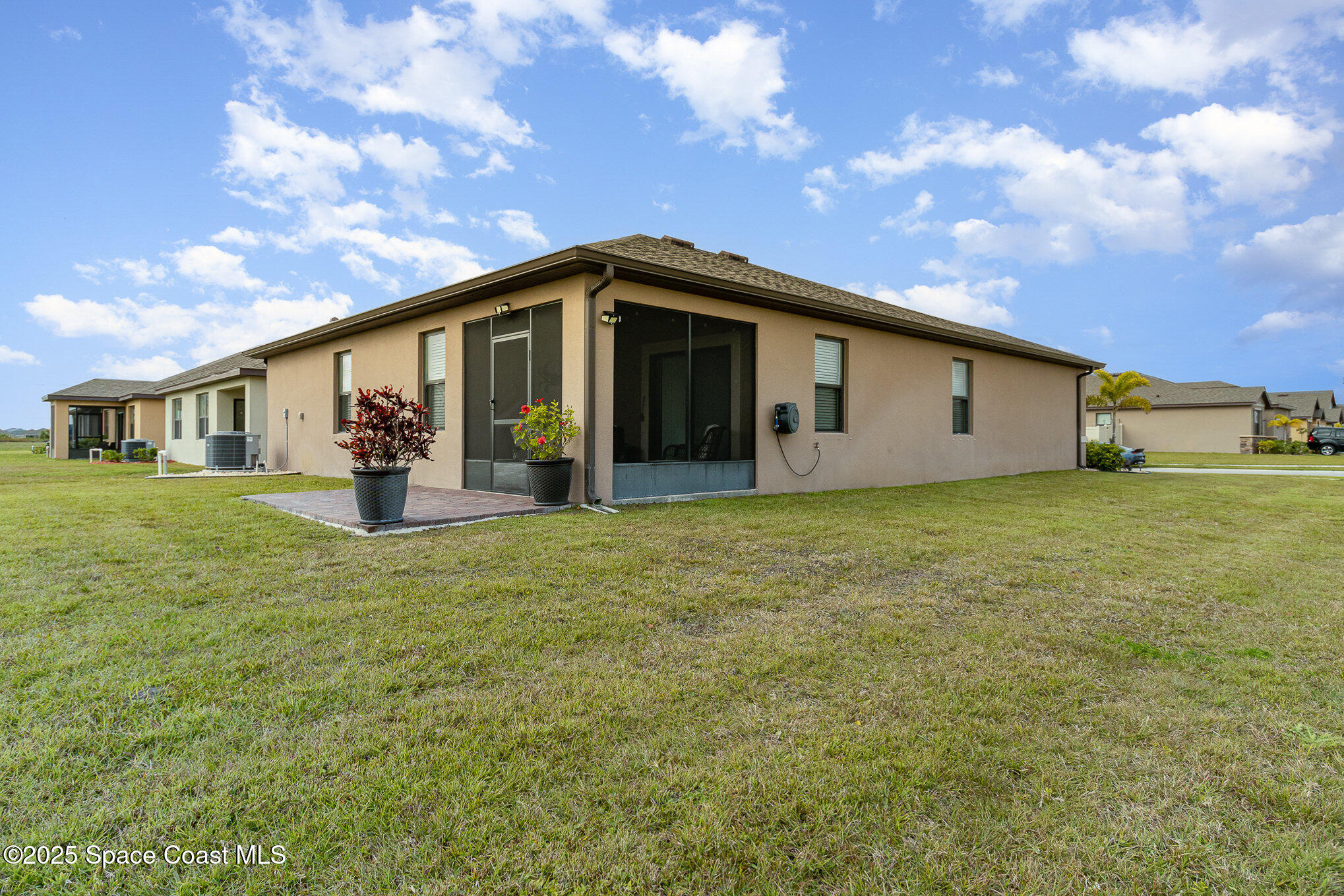 1703 Farmhouse Road Southeast Palm Bay, FL 32909 - Photo 24 of 30 Extended Paver Patio