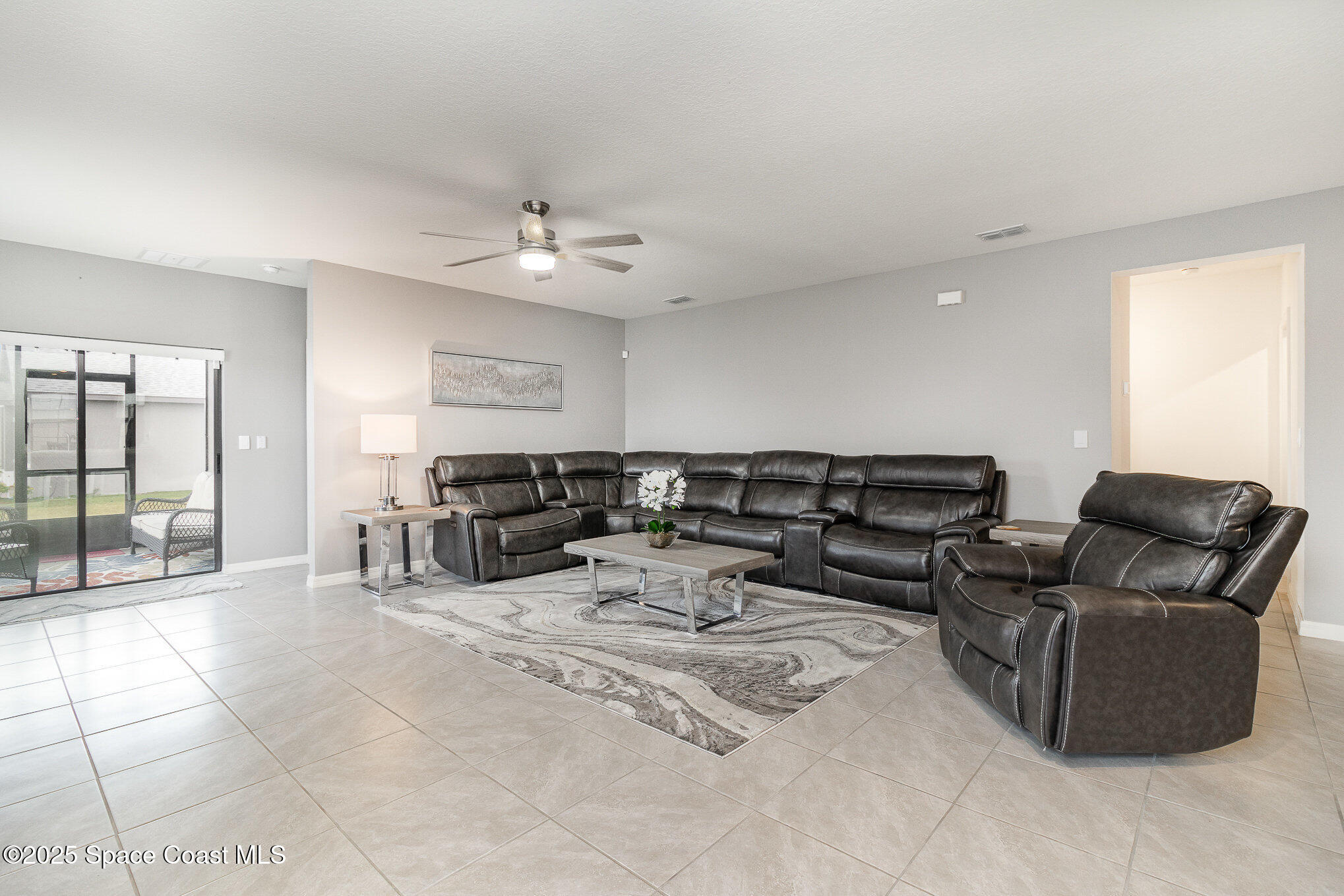 1703 Farmhouse Road Southeast Palm Bay, FL 32909 - Photo 9 of 30 Living Room