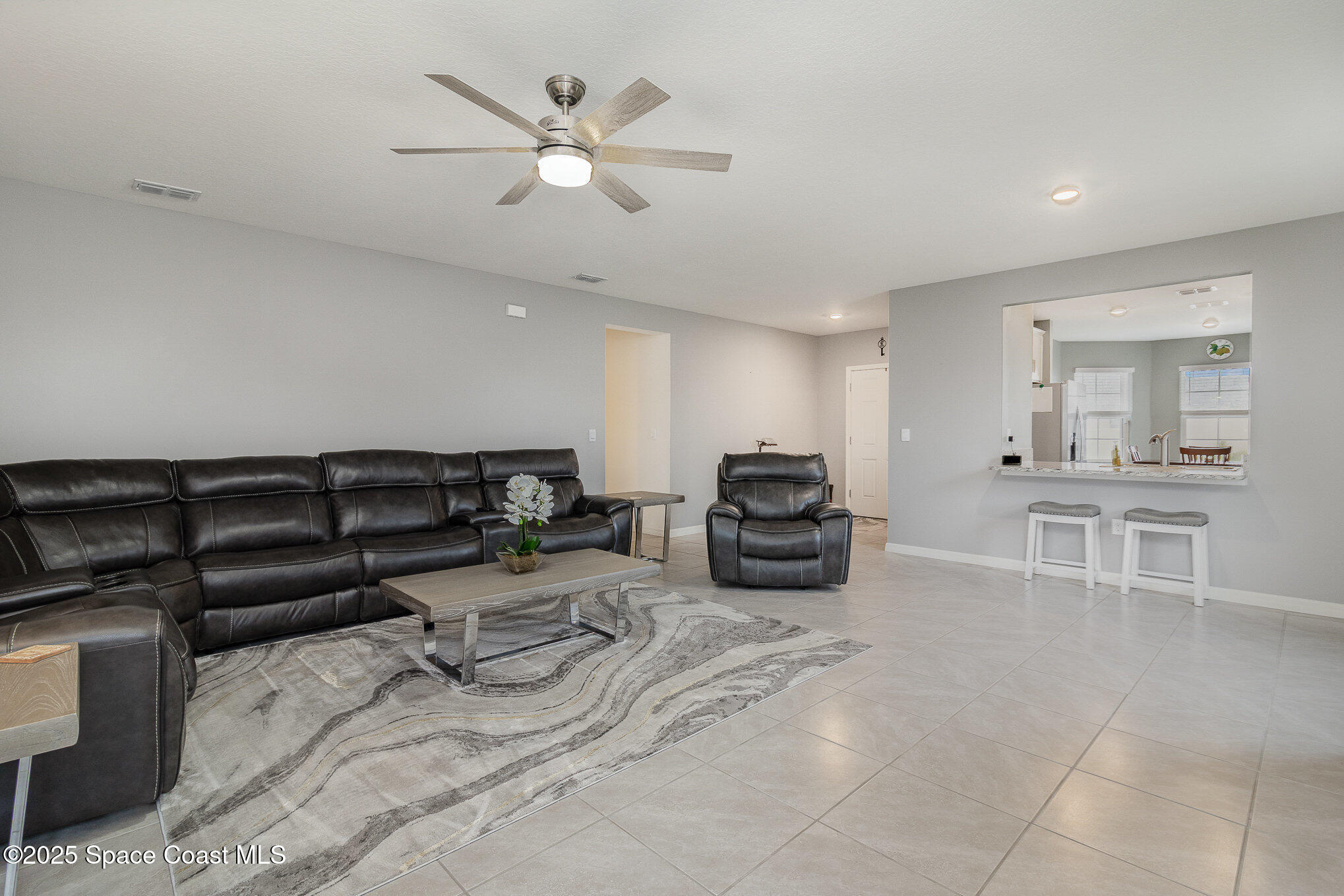 1703 Farmhouse Road Southeast Palm Bay, FL 32909 - Photo 10 of 30 Living/Dining Combo