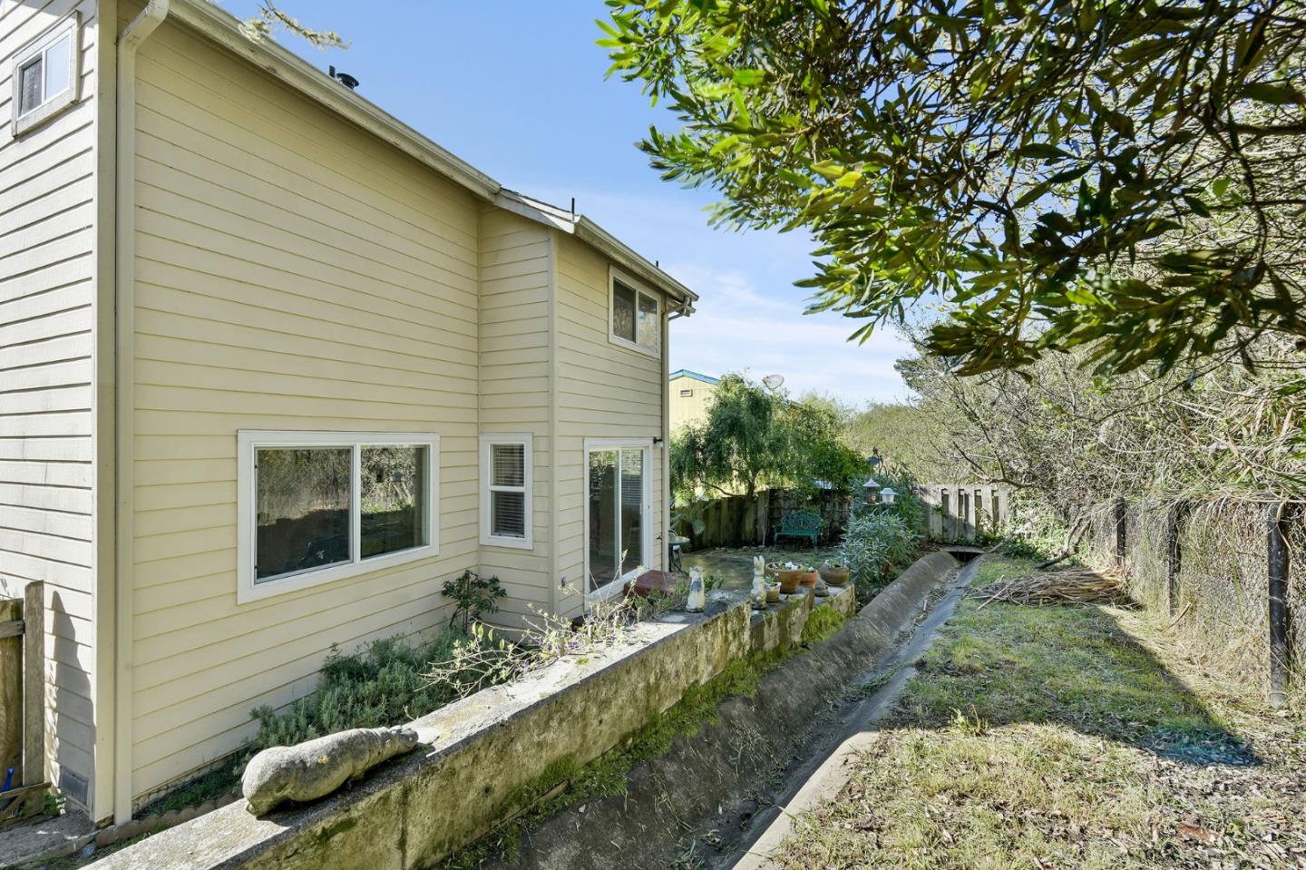 551 Monterey Road Pacifica, CA 94044 - Photo 35 of 36 a front view of a house with garden