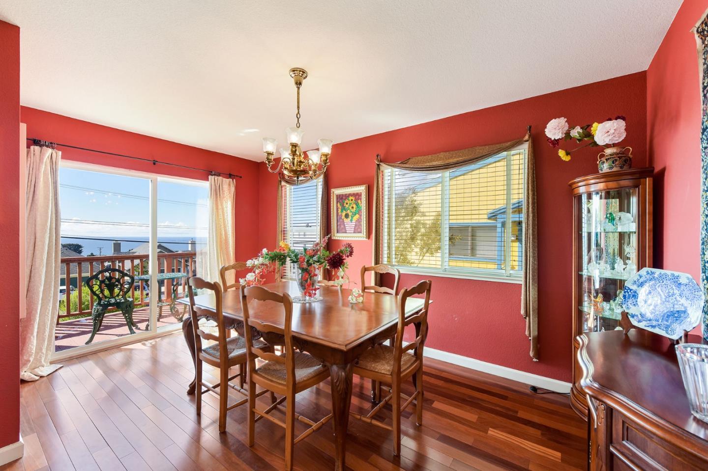 551 Monterey Road Pacifica, CA 94044 - Photo 8 of 36 a view of a dining room with furniture window and wooden floor