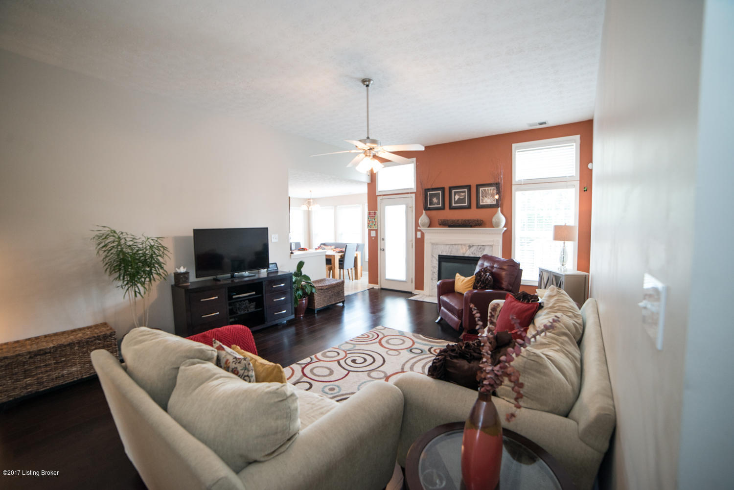 17520 Curry Branch Road Louisville, KY 40245 - Photo 6 of 45 The space is well lit from the overhead fan fixture – Natural light abounds from the elongated window, transoms and glass door to the backyard