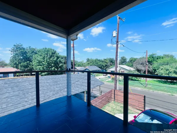a view of a porch with a sitting area