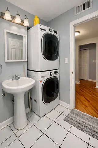 a utility room with dryer and washer