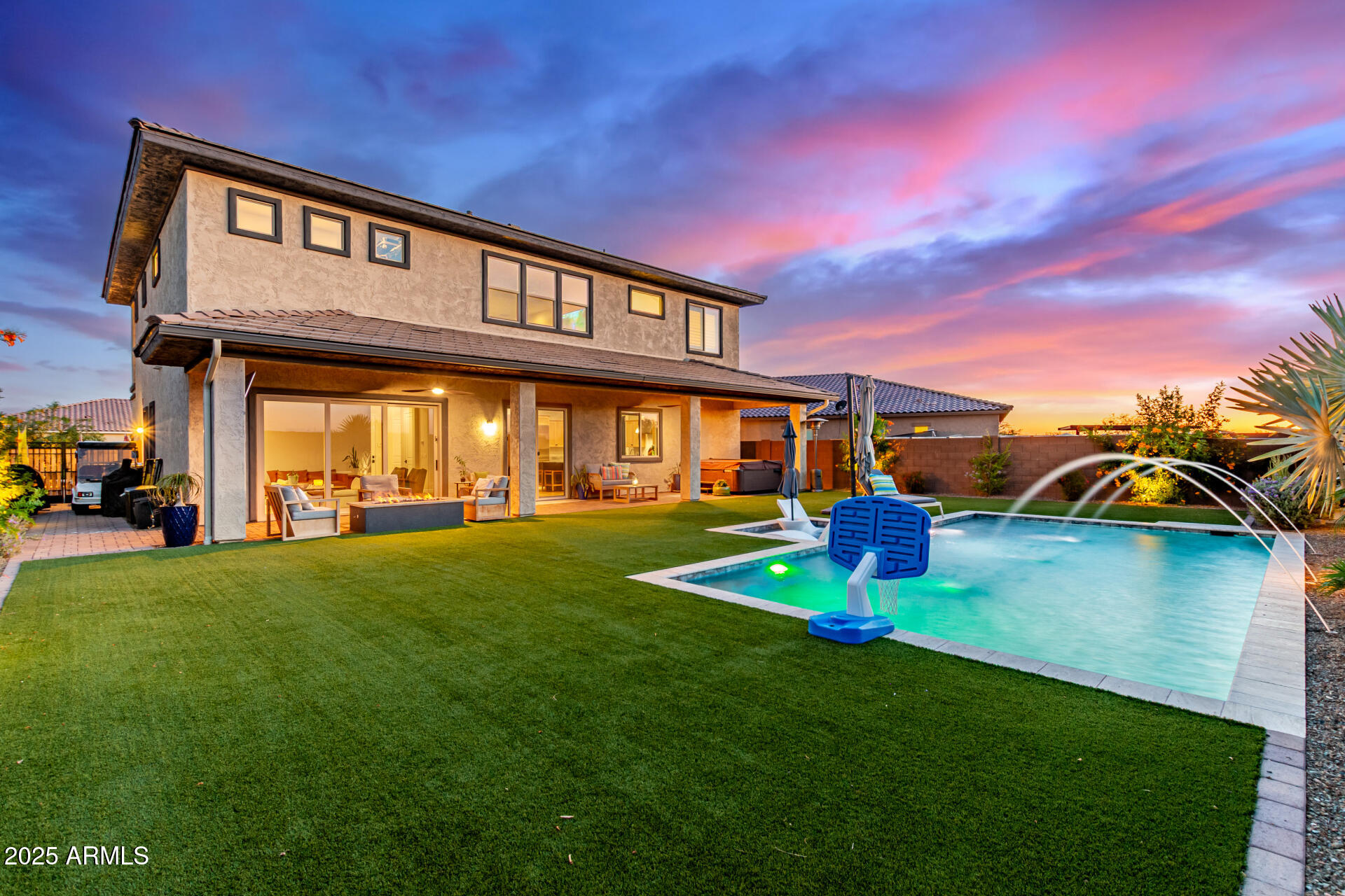 3408 East Daley Lane Phoenix, AZ 85050 - Photo 3 of 3 a front view of a house with a yard table and chairs