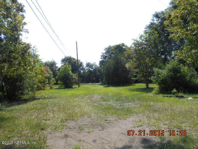 741 Lee Road Jacksonville, FL 32225 - Photo 3 of 5 a view of a field with a tree