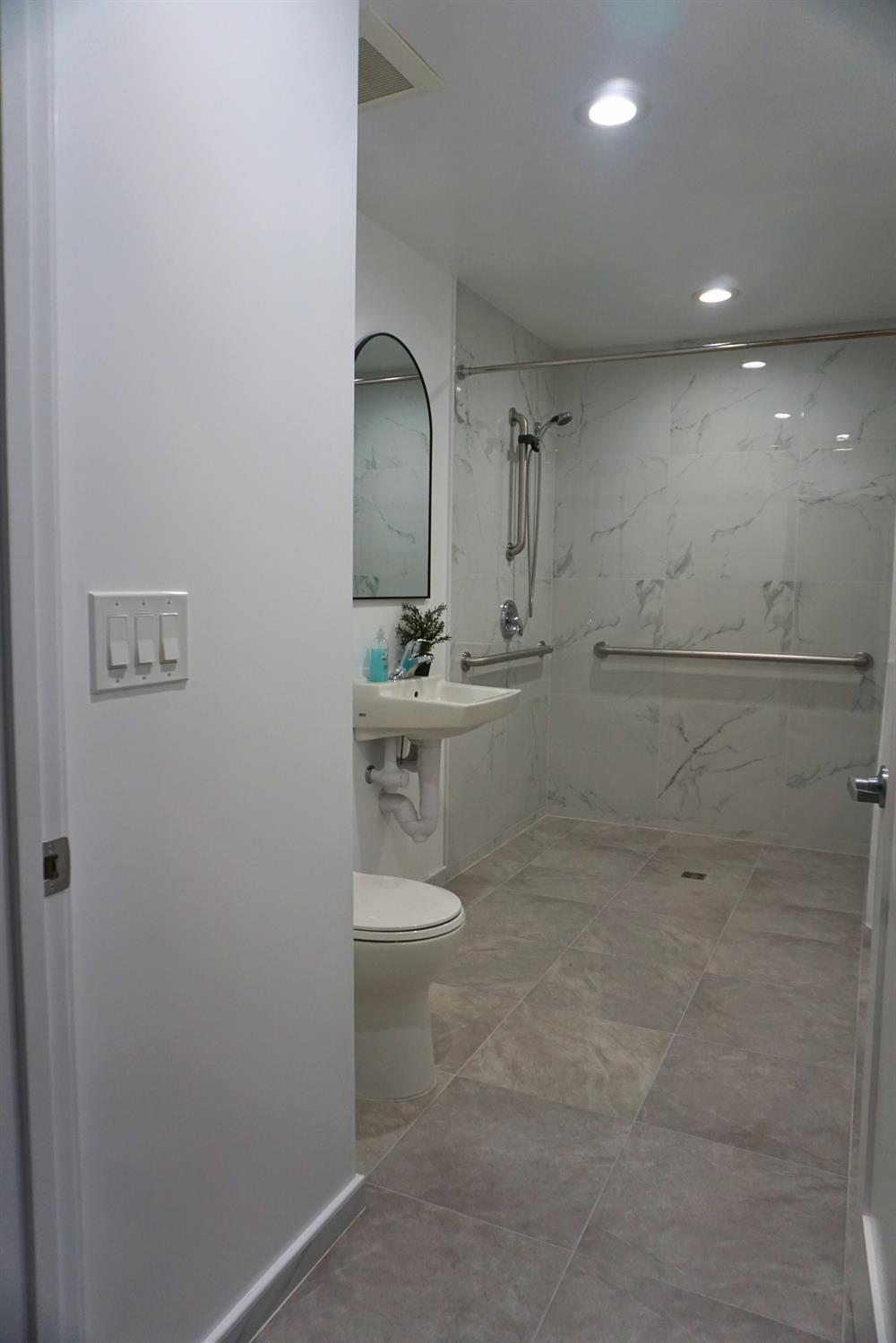 1917 Wingate Way Hayward, CA 94541 - Photo 9 of 15 a bathroom with a sink toilet and mirror