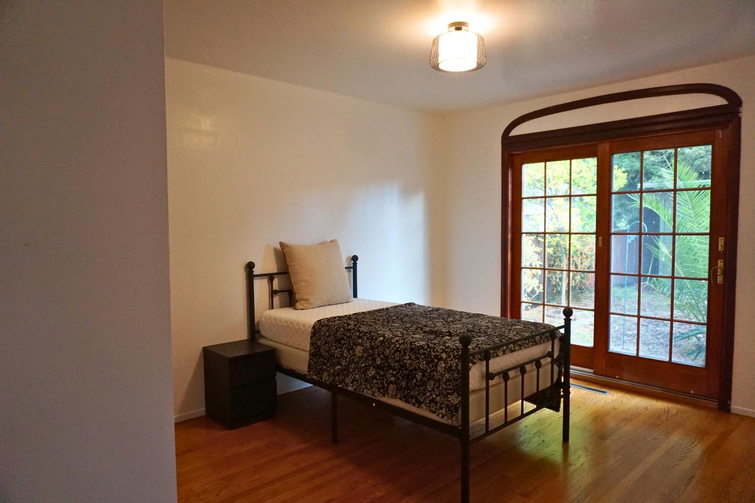 1917 Wingate Way Hayward, CA 94541 - Photo 10 of 15 a bedroom with a bed and a large window