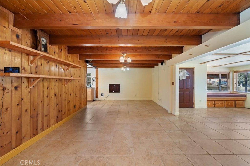 7337 Sequoia Road Wrightwood, CA 92397 - Photo 11 of 52 a view of a room with wooden walls