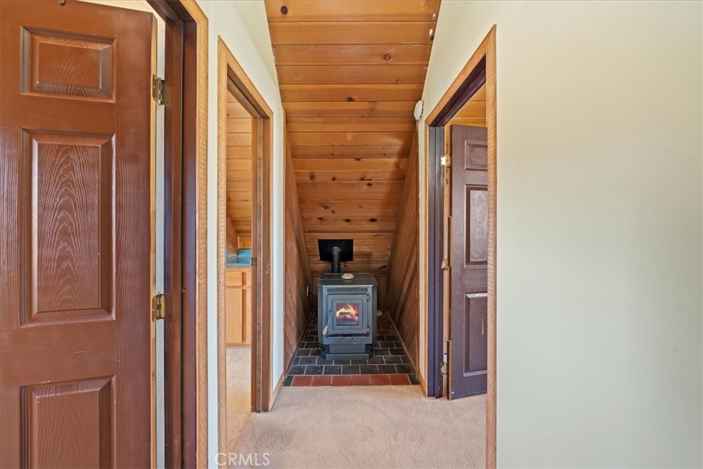 7337 Sequoia Road Wrightwood, CA 92397 - Photo 17 of 52 a view of a glass door and a window