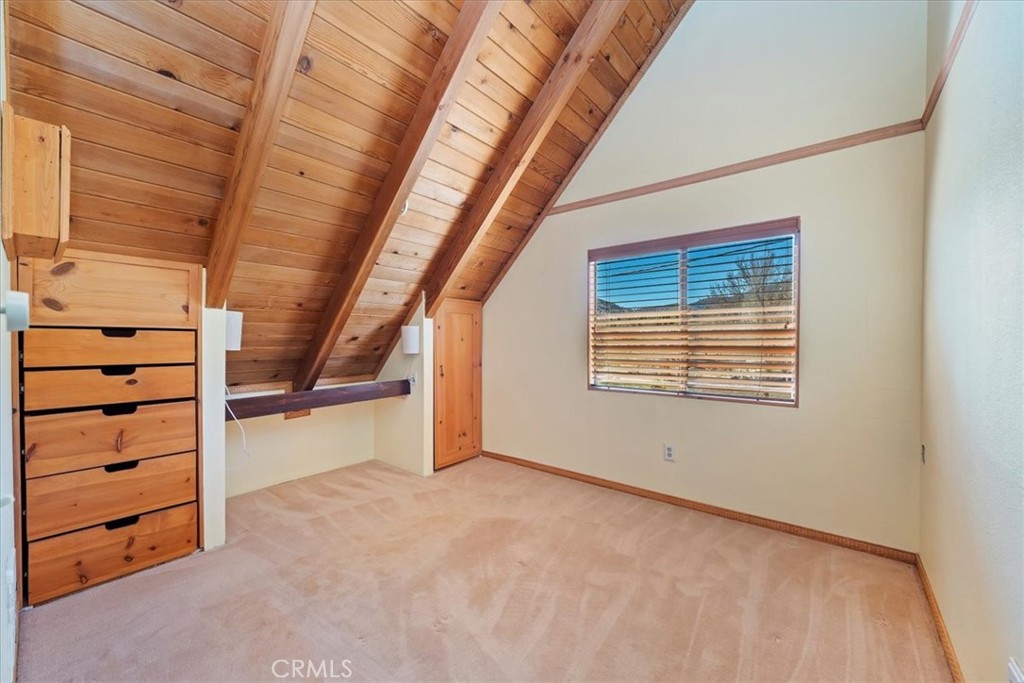 7337 Sequoia Road Wrightwood, CA 92397 - Photo 18 of 52 a view of an empty room with a window