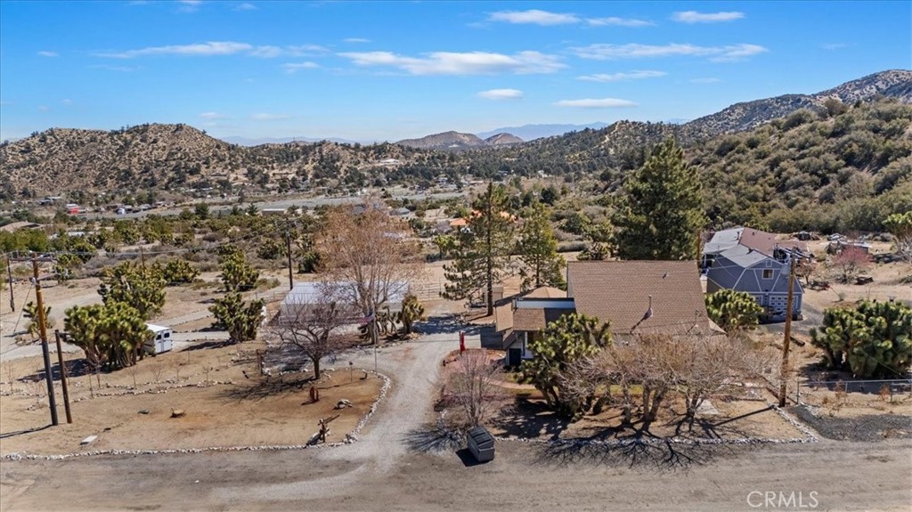 7337 Sequoia Road Wrightwood, CA 92397 - Photo 2 of 52 an aerial view of a house with a mountain