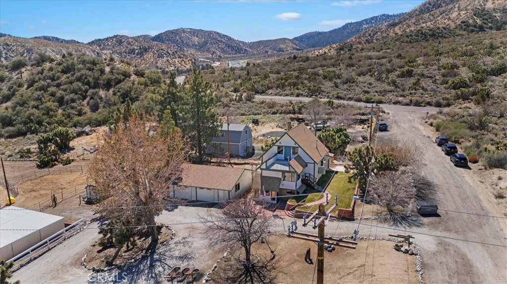 7337 Sequoia Road Wrightwood, CA 92397 - Photo 46 of 52 an aerial view of a house with a mountain