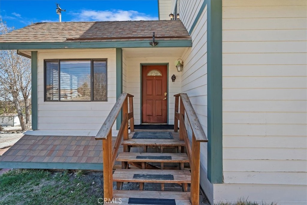 7337 Sequoia Road Wrightwood, CA 92397 - Photo 7 of 52 a view of front door of house