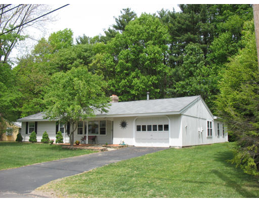 47 Eaton Road Framingham, MA 01701 - Photo 1 of 1 a view of a house with a yard and a garden