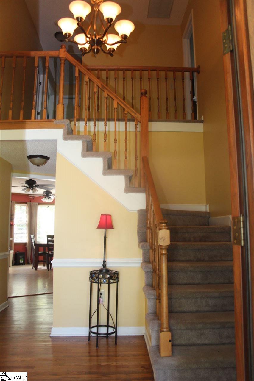 701 Hunters Hill Road Simpsonville, SC 29680 - Photo 3 of 36 The foyer with it's hardwood floors is the first thing you see as you come in the door.