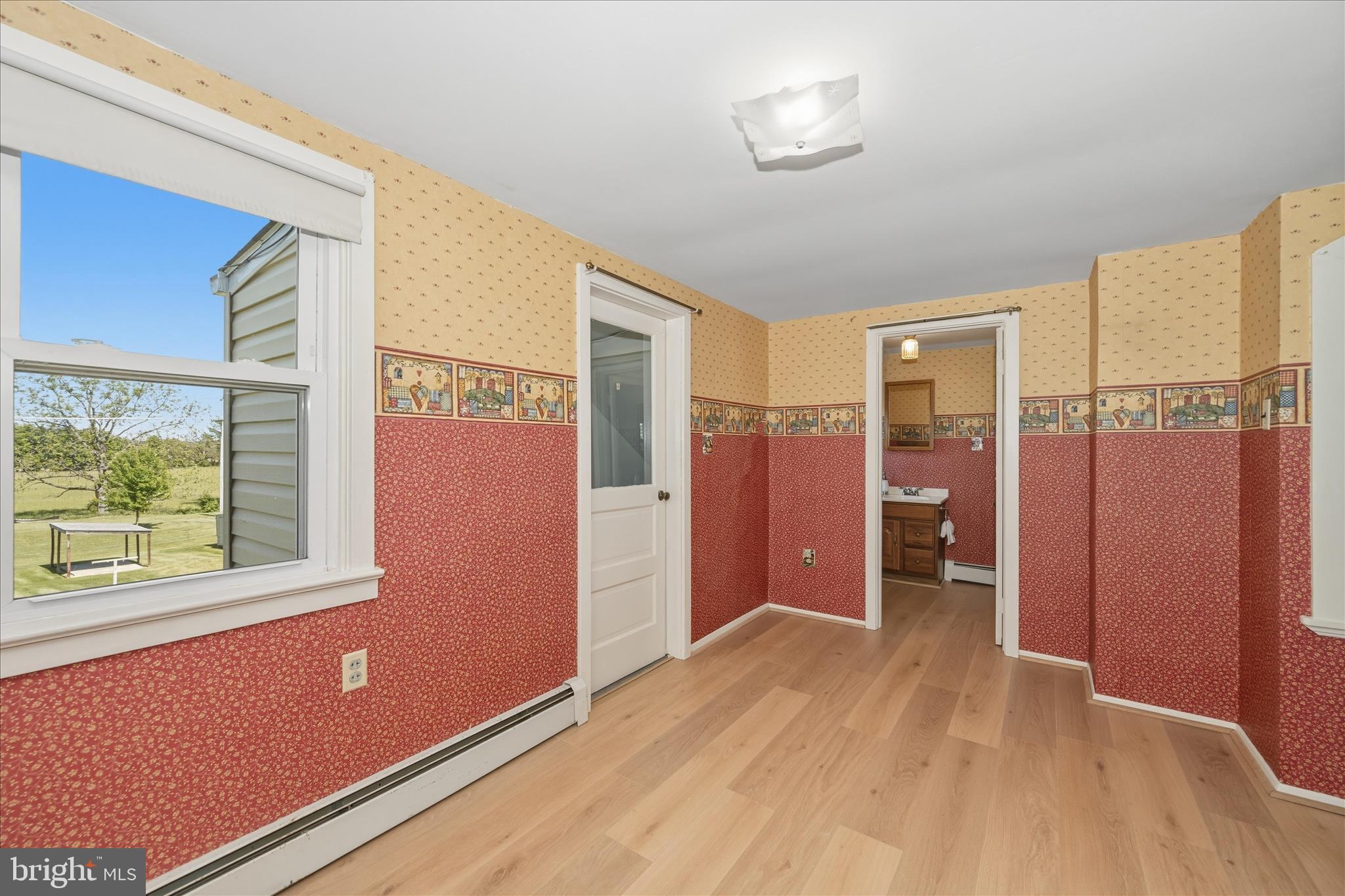 11205 Hessong Bridge Road Thurmont, MD 21788 - Photo 39 of 69 a view of a hallway with bathroom