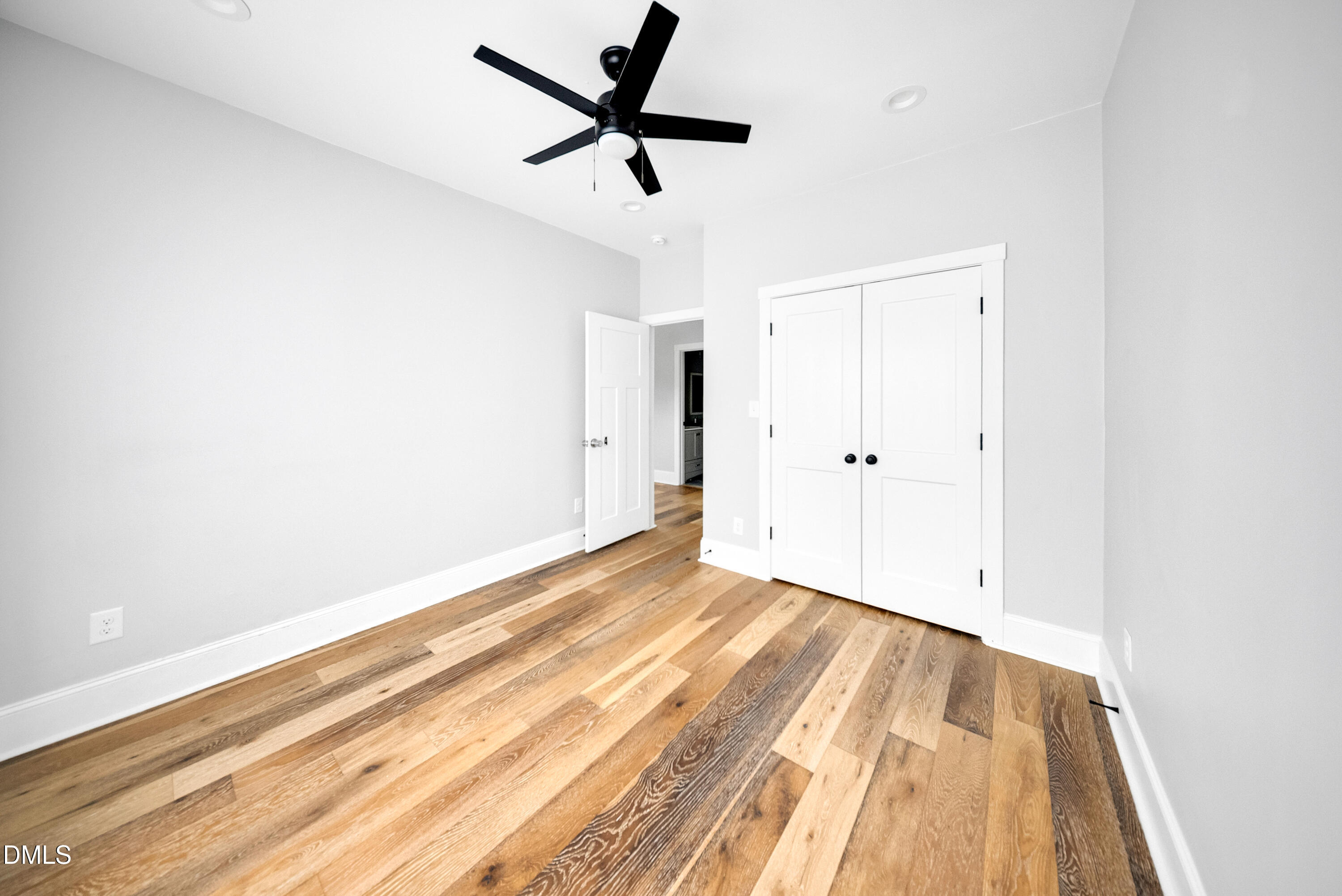 3908 Booker Avenue Durham, NC 27713 - Photo 18 of 71 a view of empty room with wooden floor