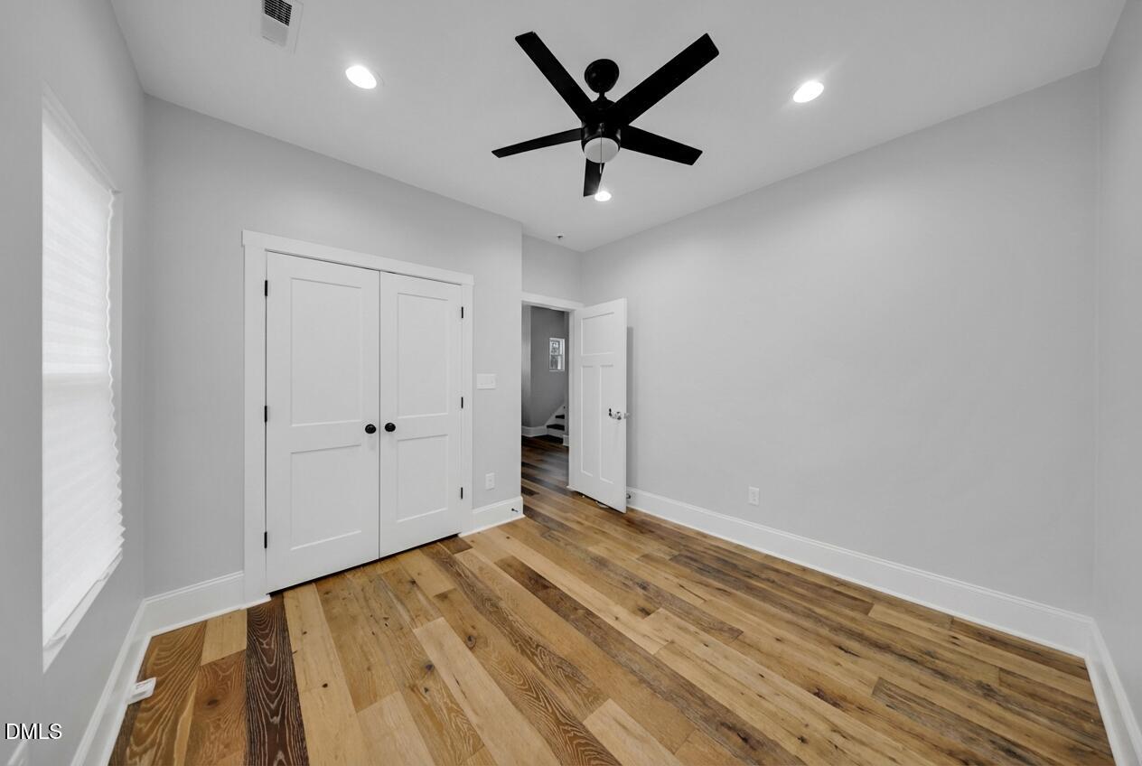 3908 Booker Avenue Durham, NC 27713 - Photo 24 of 71 wooden floor in an empty room