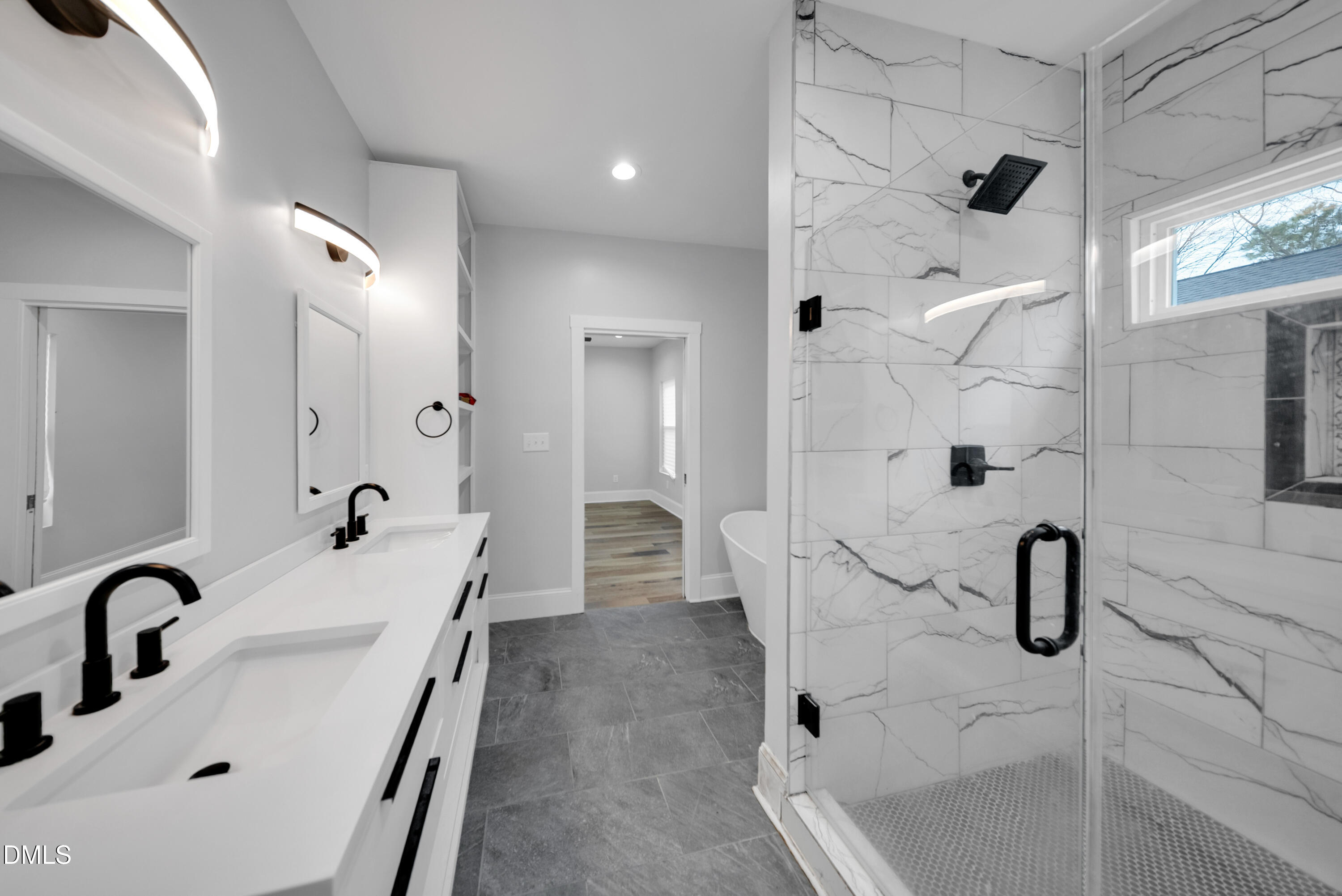 3908 Booker Avenue Durham, NC 27713 - Photo 38 of 71 a bathroom with a sink and mirror