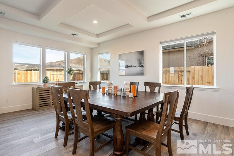 2337 Stone Rise Road Reno, NV 89521 - Photo 11 of 25 a view of a dining room with furniture and windows