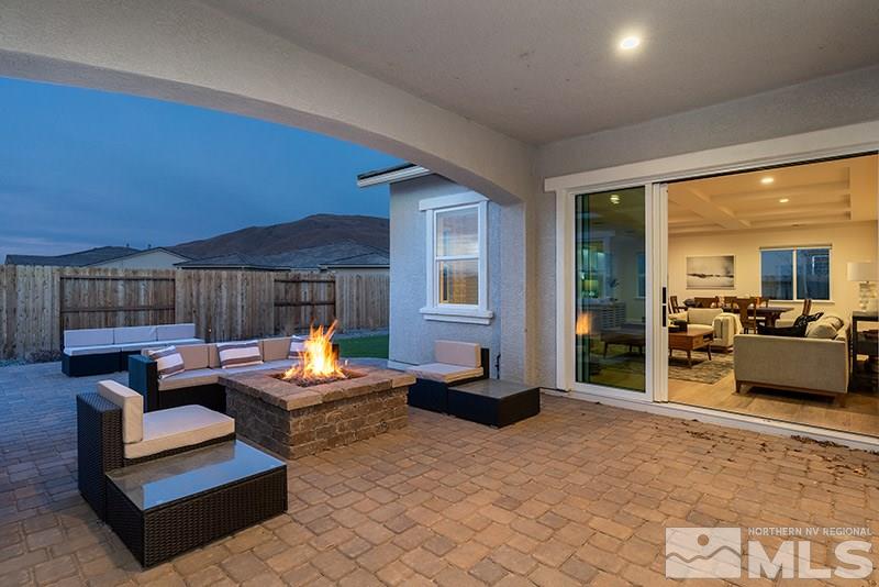 2337 Stone Rise Road Reno, NV 89521 - Photo 15 of 25 a outdoor living space with furniture and a rug