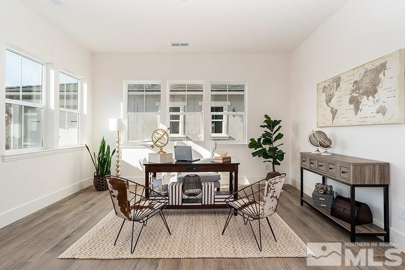 2337 Stone Rise Road Reno, NV 89521 - Photo 21 of 25 a dinning room with furniture and wooden floor