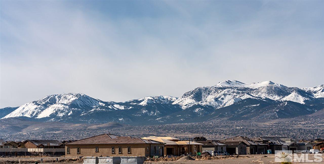 2337 Stone Rise Road Reno, NV 89521 - Photo 24 of 25 a view of a big house with a mountain in the background