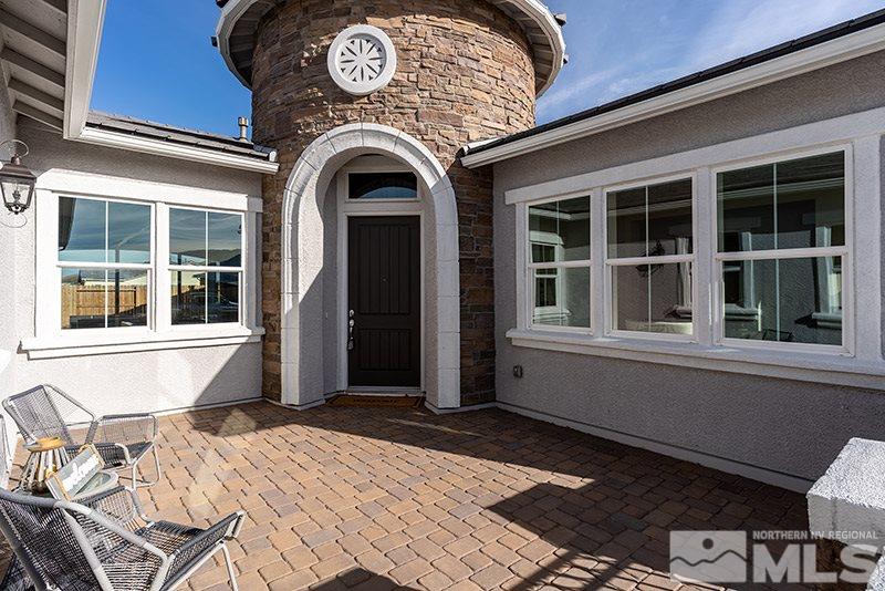 2337 Stone Rise Road Reno, NV 89521 - Photo 3 of 25 a front view of a house with many windows