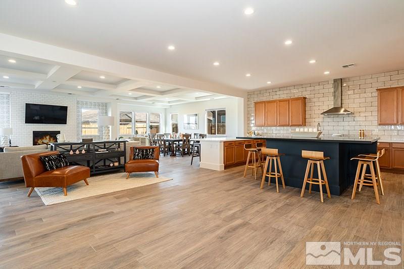 2337 Stone Rise Road Reno, NV 89521 - Photo 5 of 25 a living room with furniture and a wooden floor