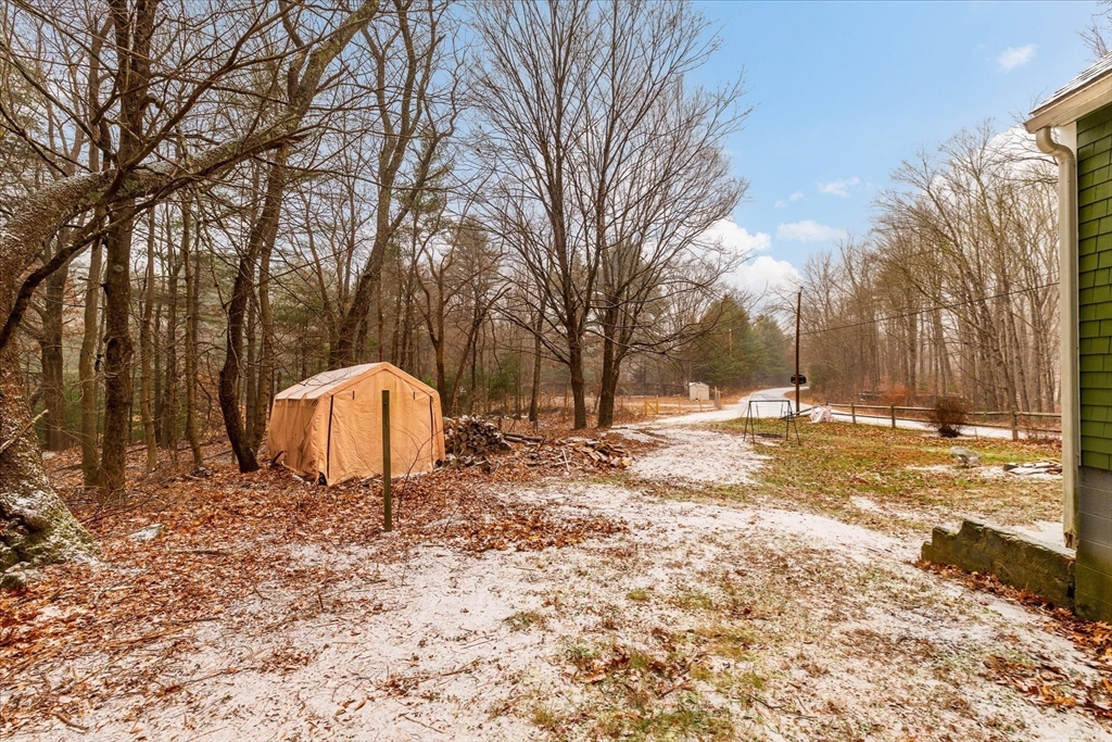 13 Morse Road Holland, MA 01521 - Photo 19 of 25 a view of a backyard of snow
