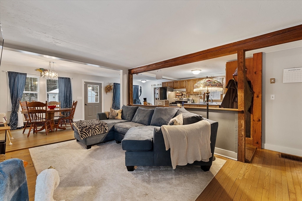 13 Morse Road Holland, MA 01521 - Photo 9 of 25 a living room with furniture and a large window