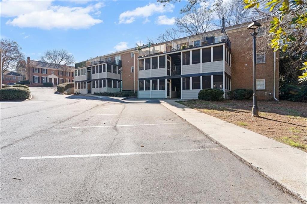 1101 Collier Road Northwest, Unit T5 Atlanta, GA 30318 - Photo 26 of 32 a view of a building with a street