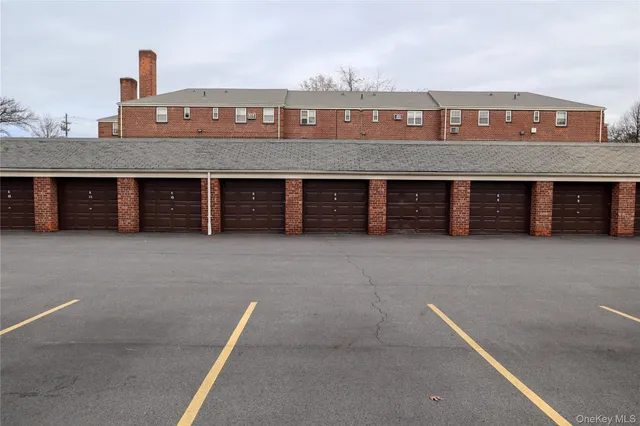 a front view of a house with a large window