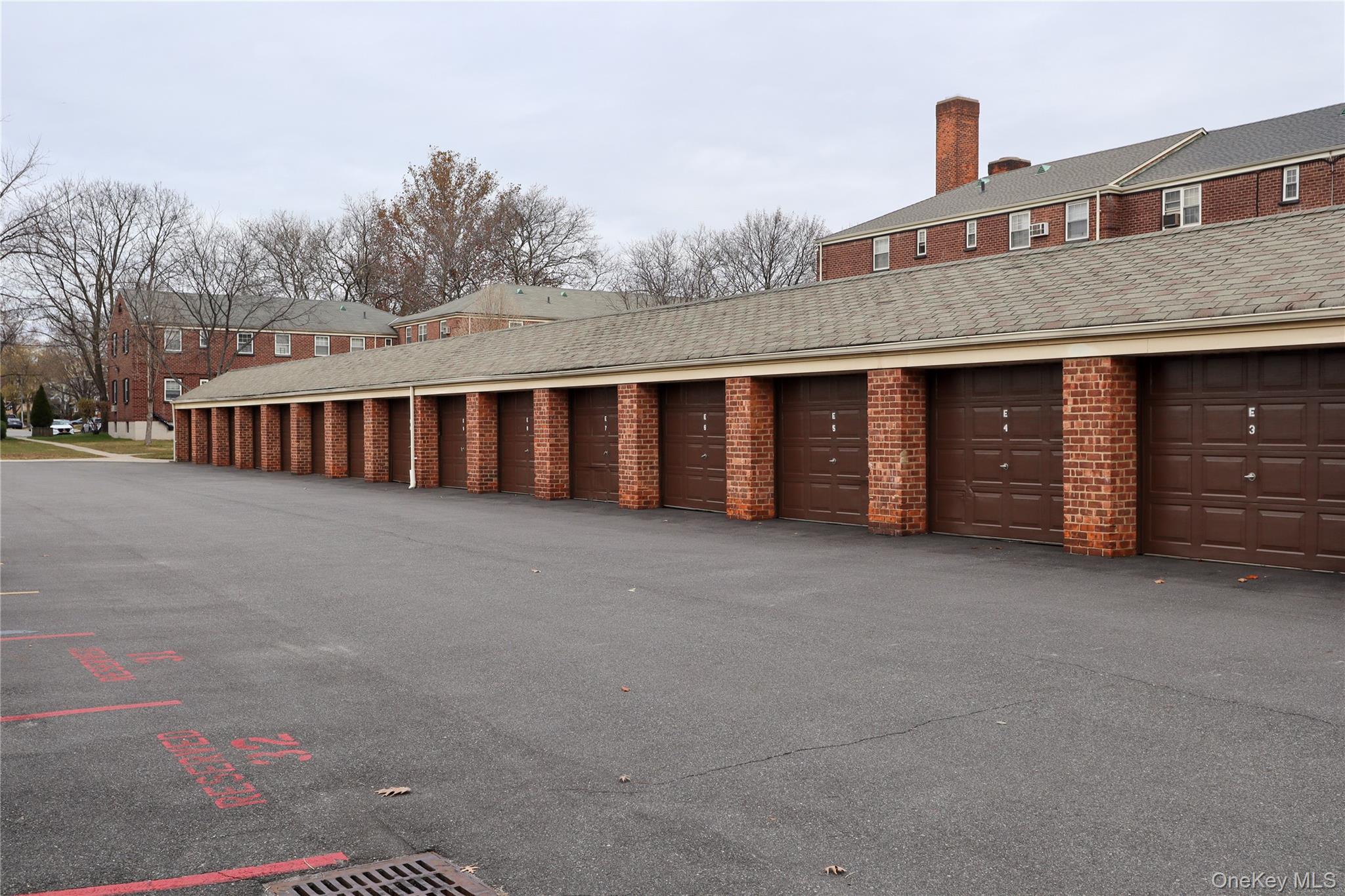 211-07 73rd Avenue, Unit 349 Queens, NY 11364 - Photo 6 of 6 a view of a house with a yard