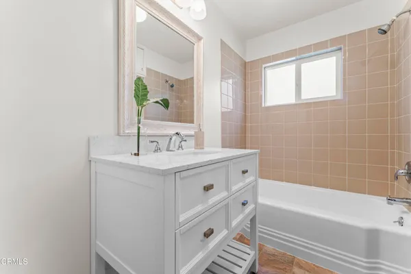 a bathroom with a sink and a bathtub