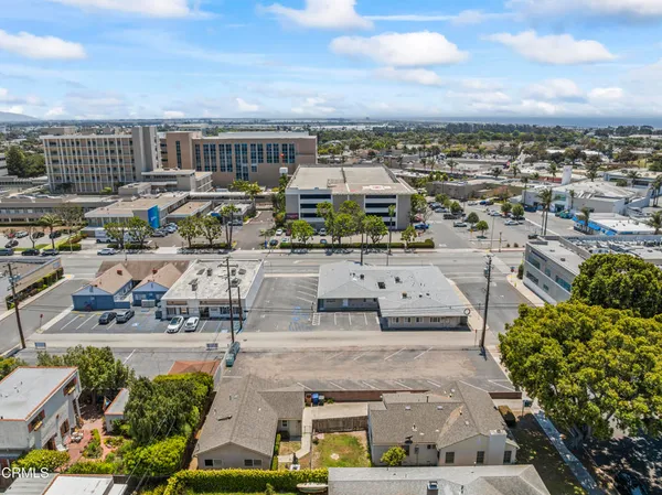 an aerial view of a building with outdoor space